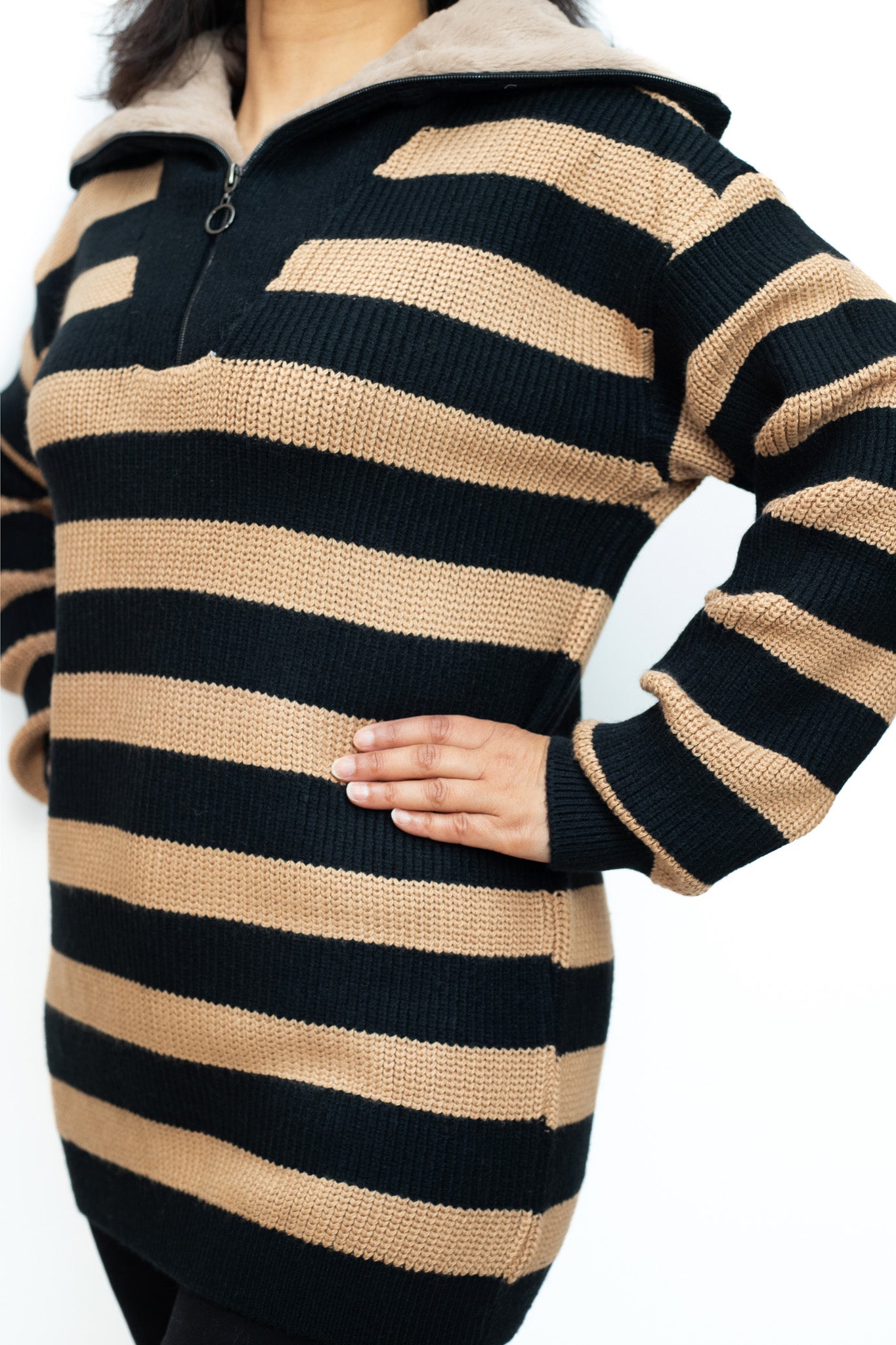 Black and brown striped jumper with fur collar